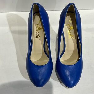 Blue Platform heel Pumps size 8 NWOT. Never worn